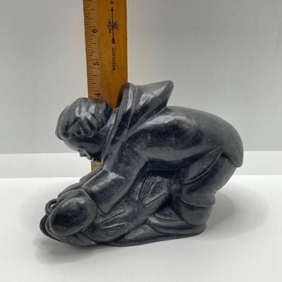 LOT 63: Carved Inuit Soapstone Art Sculpture - Boy with Fish