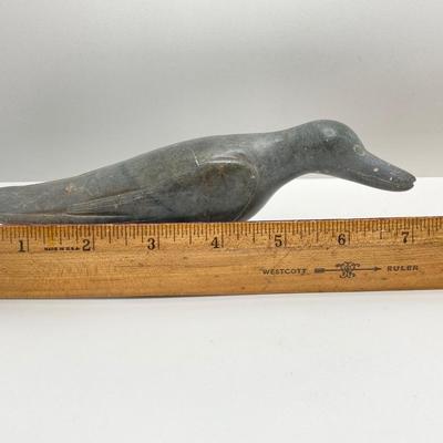 LOT 64: Pair of Carved Inuit Sculptures and Canadian Eskimo Art Book