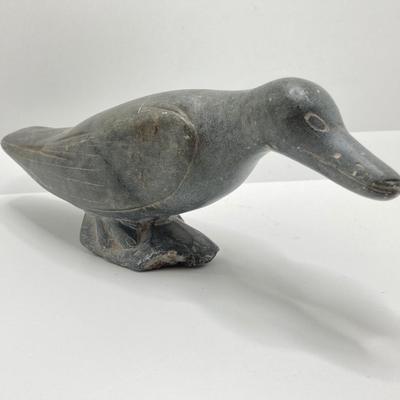 LOT 64: Pair of Carved Inuit Sculptures and Canadian Eskimo Art Book