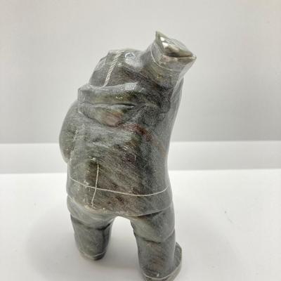 LOT 64: Pair of Carved Inuit Sculptures and Canadian Eskimo Art Book