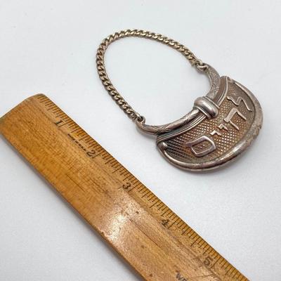 LOT 173: Vintage Sterling Silver "To Life" Celebration Liquor Bottle Decanter Tag - TW 68.06g