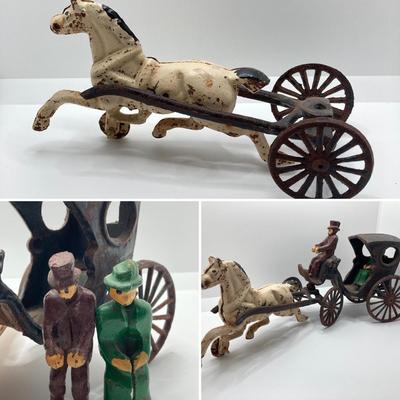 LOT 180: Vintage / Antique Cast Iron Horse and Carriage with Driver and Passenger