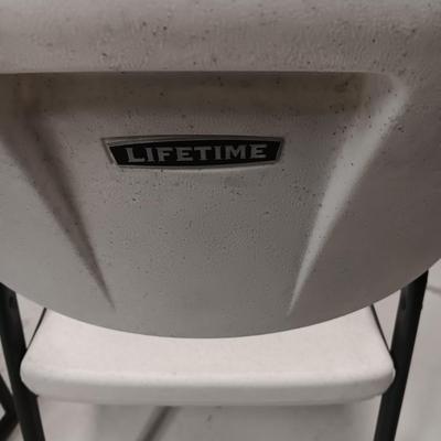 LIFETIME 4 FOOT TABLE AND 2 LIFETIME FOLDING CHAIRS