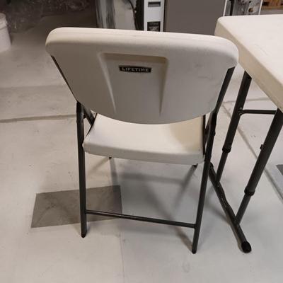 LIFETIME 4 FOOT TABLE AND 2 LIFETIME FOLDING CHAIRS