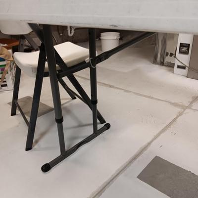 LIFETIME 4 FOOT TABLE AND 2 LIFETIME FOLDING CHAIRS