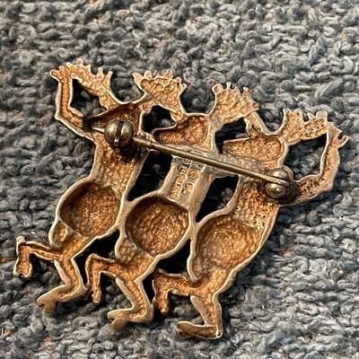 LOT 119 COLLECTABLE CAROL FELLEY CHRISTMAS DANCING REINDEER PIN