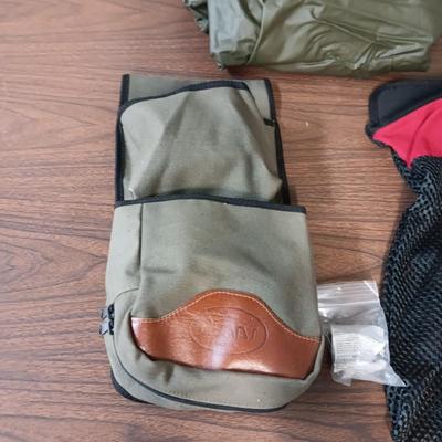 SHOTGUN CLEANER, BELT POUCHES, HEADLIGHT AND RAIN PONCHO