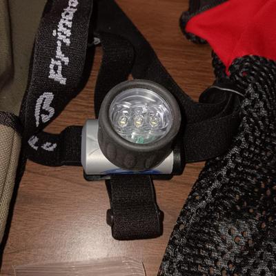 SHOTGUN CLEANER, BELT POUCHES, HEADLIGHT AND RAIN PONCHO
