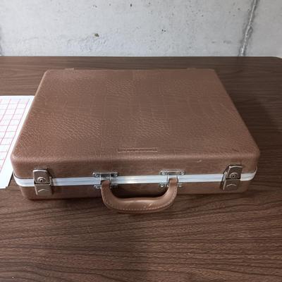 GUN GUARD CASE, PAPER TARGETS AND EAR PLUGS