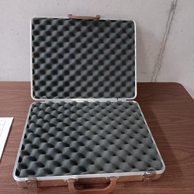 GUN GUARD CASE, PAPER TARGETS AND EAR PLUGS