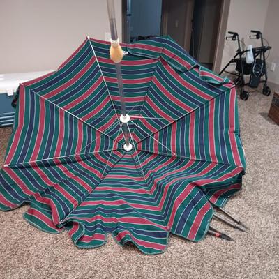 PATIO UMBRELLA IN GREAT SHAPE AND SOLAR LIGHTS