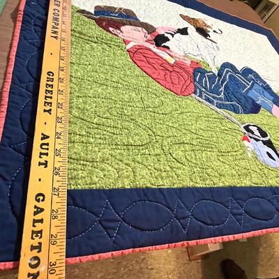 Lot 130 Norman Rockwell Quilt displays