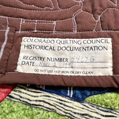Lot 130 Norman Rockwell Quilt displays