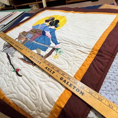 Lot 130 Norman Rockwell Quilt displays