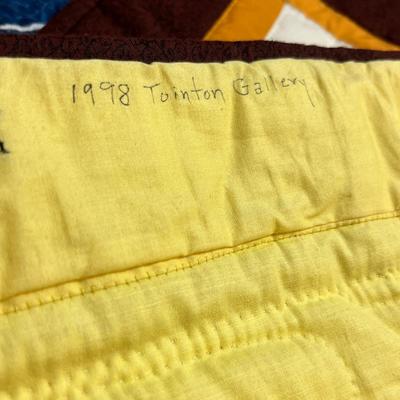 Lot 130 Norman Rockwell Quilt displays