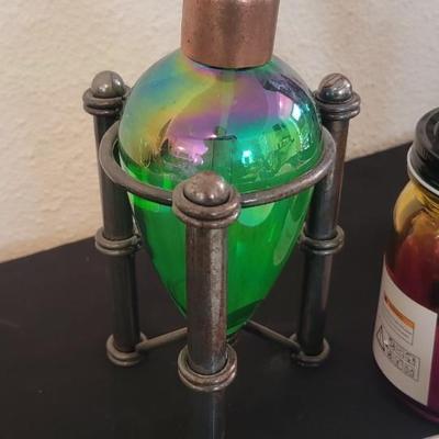 Oil lamp multiples and vase