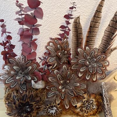 Feather centerpiece, vases, antlers