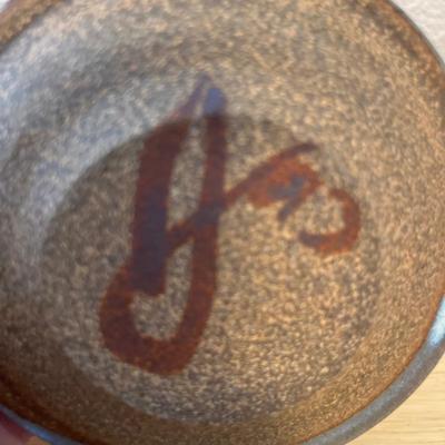 Signed pottery candlesticks