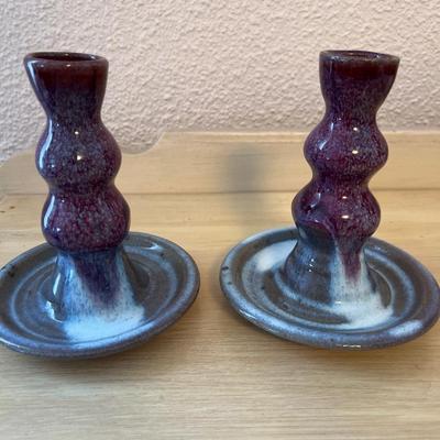 Signed pottery candlesticks