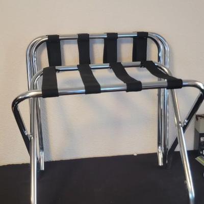 Two chrome and web luggage racks