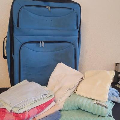 Towels and large luggage