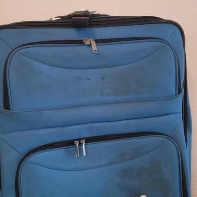 Towels and large luggage