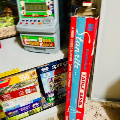 Art, game, puzzles and metal shelf lot