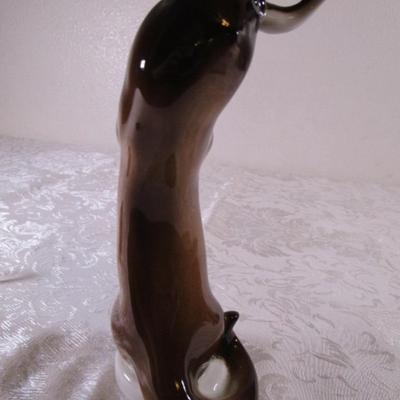 Lomonosov Imperial Porcelain otter standing with fish figurine