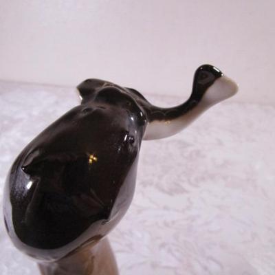 Lomonosov Imperial Porcelain otter standing with fish figurine