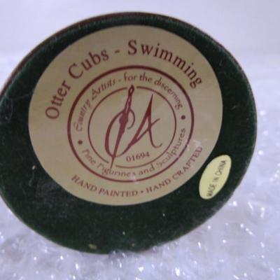 Country Artists "Otter Cubs - Swimming"