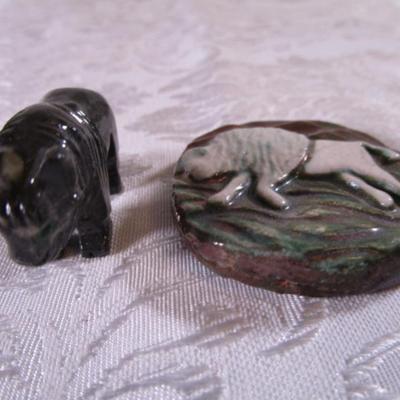 Carved stone buffalo figurine, round ceramic buffalo disc
