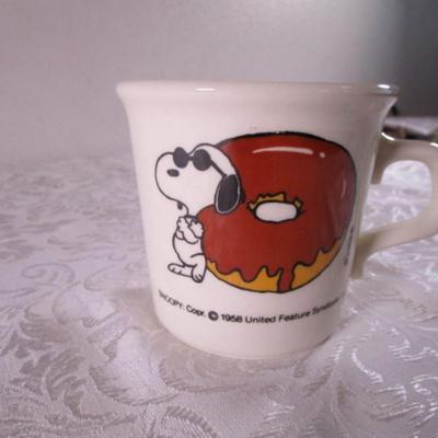 Snoopy with a doughnut mug