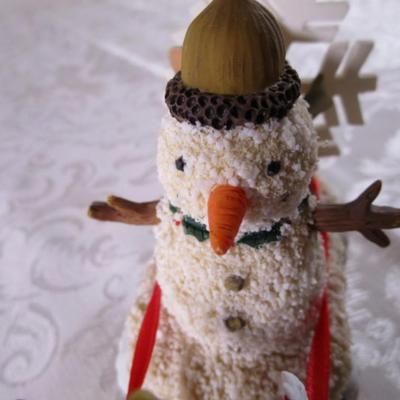 Ceramic decorative wheeled sleigh