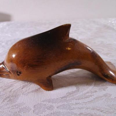 Carved exotic wooden dolphin