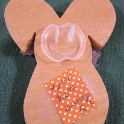 7 wooden craft bunnies that plug into outlets