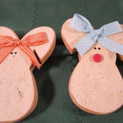7 wooden craft bunnies that plug into outlets
