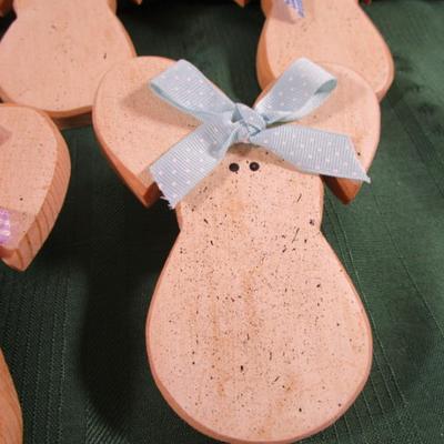 7 wooden craft bunnies that plug into outlets
