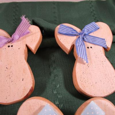 7 wooden craft bunnies that plug into outlets