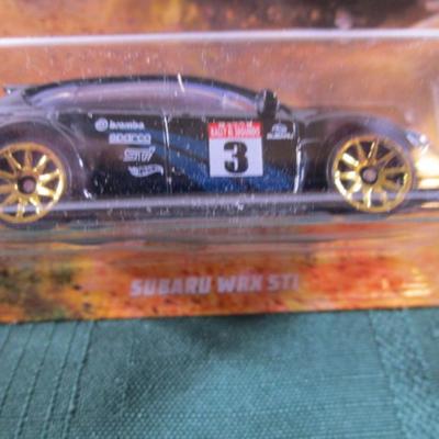 2 Hot Wheels cars