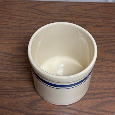 KITCHEN UTENSILS AND A CROCK LIKE HOLDER