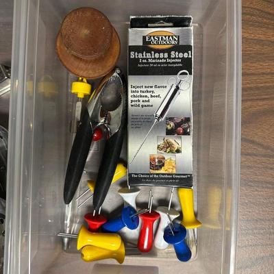 KITCHEN UTENSILS AND A CROCK LIKE HOLDER