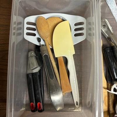 KITCHEN UTENSILS AND A CROCK LIKE HOLDER