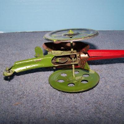 LOT 184 WONDERFUL VINTAGE TIN LITHO WINDUP/LEVER ACTION MANNED CANNON TOY
