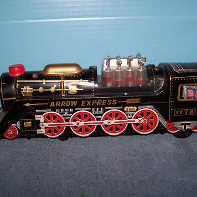 LOT 187 TIN LITHO BATTERY OPERATED ARROW EXPRESS LOCOMOTIVE
