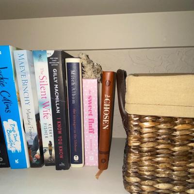 LINED WICKER BASKET, AND A VARIETY OF READING MATERIAL