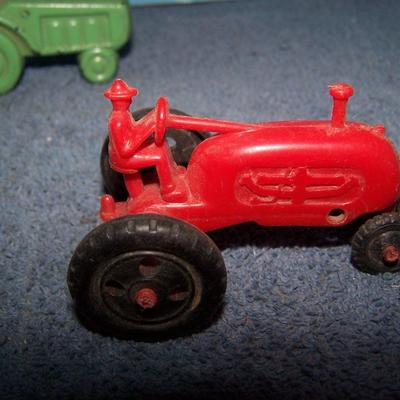 LOT 199 2 SMALL PLASTIC & 1 HARD RUBBER TRACTORS