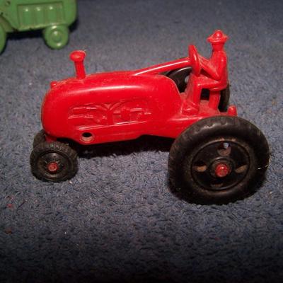 LOT 199 2 SMALL PLASTIC & 1 HARD RUBBER TRACTORS