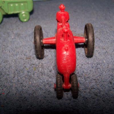 LOT 199 2 SMALL PLASTIC & 1 HARD RUBBER TRACTORS