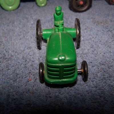 LOT 199 2 SMALL PLASTIC & 1 HARD RUBBER TRACTORS