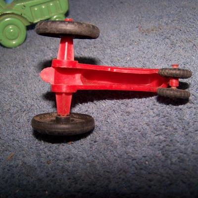 LOT 199 2 SMALL PLASTIC & 1 HARD RUBBER TRACTORS